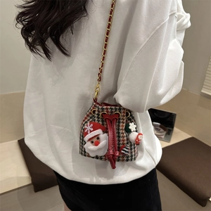 Toddler houndstooth bucket bag with festive 3D Santa and snowman plush decorations