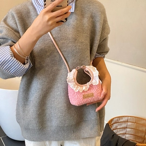 Pink fleece mini crossbody bag for kids with white lace trim and handmade leather label