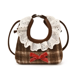 Brown plaid pet bib with white lace trim and a red glitter bow on a white background