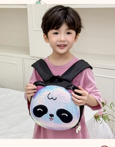 Close-up of sparkling sequin panda backpack with embroidery details and adjustable straps