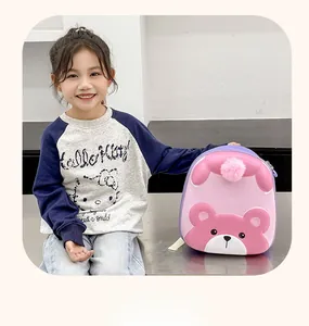 Pink and purple kids backpack with 3D bear character and plush ball detail