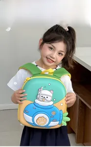 Front view of a child wearing a colorful cartoon submarine backpack with padded straps