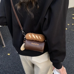 Cute baguette bread shaped mini crossbody bag with brown plush texture for kids