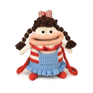 Handmade crochet doll crossbody bag for kids with red stripes and blue overalls
