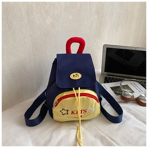 Detailed view of dark blue and yellow star backpack with durable KLTS branding