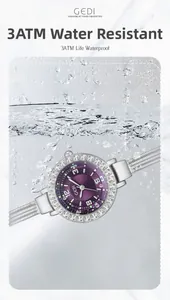 Detailed view of silver mesh watch with purple dial under splashing water for 3ATM waterproof test