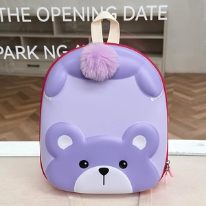 Detail of purple 3D cartoon bear toddler backpack with plush pom-pom and beige straps