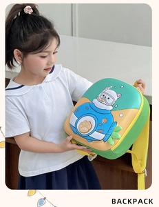 Detail of 3D embossed cartoon cat backpack with breathable yellow mesh straps for kids