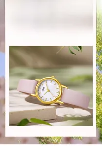 Elegant gold watch with a white mother-of-pearl dial and a soft pink leather strap