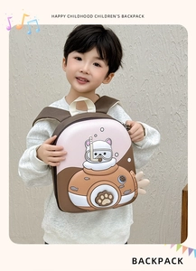 Toddler modeling a cute bear submarine backpack with colorful 3D fins on white background