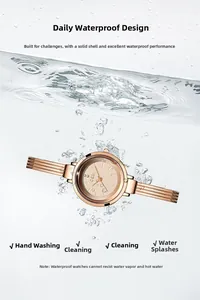 Detailed view of the rose gold mesh watch submerged in water to show daily waterproof feature