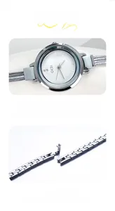 Macro view of silver mesh watch strap with jewelry clasp and GEDI watch head details