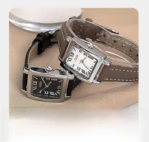 Macro detail of GEDI vintage square watches with sunray dials and leather straps