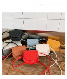 Close-up of mini quilted leather crossbody bags for kids in six vibrant solid colors