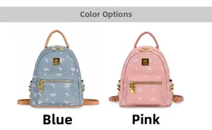 Detail of pink and blue mini backpacks with cute bear prints and gold hardware
