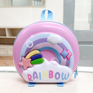 Detail view of pink EVA hardshell kids backpack featuring 3D rainbow and star patterns