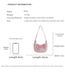 Pink nylon crescent tote bag shown with iPhone 16 Pro Max for size comparison