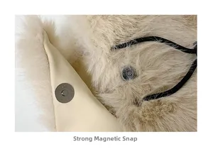 Detail of strong magnetic closure on soft beige plush backpack with leather lining