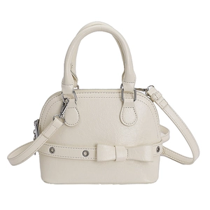 Chic beige shell handbag with embossed leather texture and decorative front bow