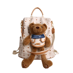 Süßer cremefarbener Bärenrucksack mit 3D-Plüschbär und modischem Monogramm-Muster
