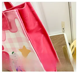 Close-up of pink checkered tote bag edge stitching and high-quality piping detail