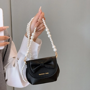 Cute black mini PU leather crossbody bag with bow decoration and pearl handle for girls