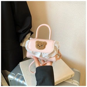 Pink faux leather kids bag with cute plush bear patch and delicate white lace trim