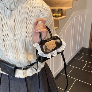 Cute kids mini teddy bear shoulder bag with white lace trim and black patent finish
