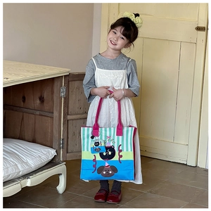 Detailed view of kids cartoon canvas tote with pink handles and cute pet animal prints