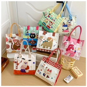 Multiple cute cartoon canvas tote bags for kids with animal prints and side pocket detail