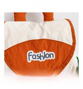 Detail view of water-resistant textured fabric with fashion label on the kids' backpack