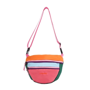 Colorful kids crossbody bag in vibrant nylon patchwork with adjustable pink strap