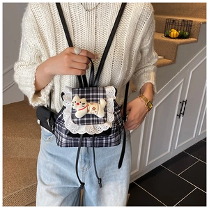Toddler girl plaid backpack with lace trim and cute plush cat doll detail on back