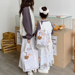 Floral backpack with Merci embroidery and teddy bear charm for parent-child matching