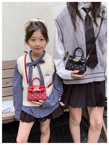 Polka dot mini tote bags for kids with gold twist locks in red and black styles