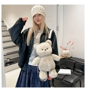 Detail of cute off-white plush bear backpack for kids with fluffy faux fur texture