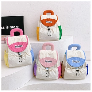 Close-up of lightweight kids backpacks in four color-block styles with drawstring closure