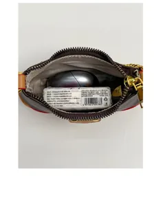 Détail intérieur du mini sac à bandoulière monogramme avec fermeture éclair