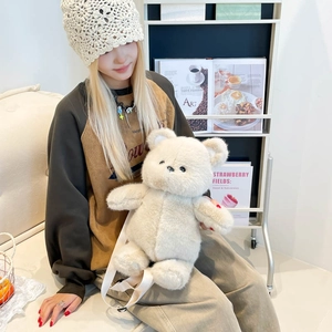 Cute white plush teddy bear backpack for kids with adjustable straps and soft texture