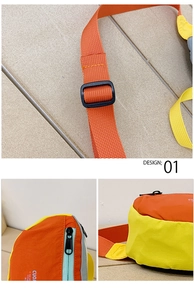 Detail of color-block kids chest bag in bright orange and yellow durable nylon fabric
