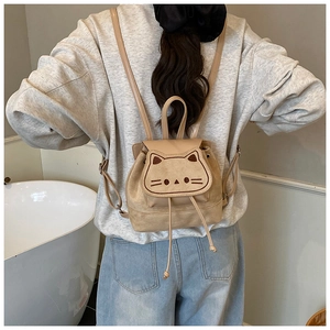 Detail of khaki cat toddler backpack with embroidery and drawstring closure