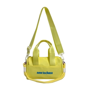 Minimalist yellow nylon bucket bag for kids with blue lettering and adjustable shoulder strap