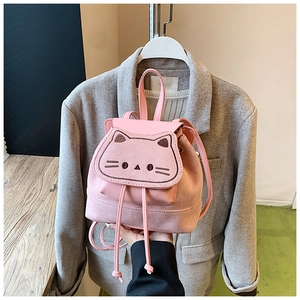 Close-up of pink cat backpack showing embroidery details and soft frosted texture