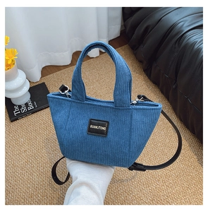 Sac seau bleu en velours côtelé pour enfants avec logo en cuir et double bandoulière