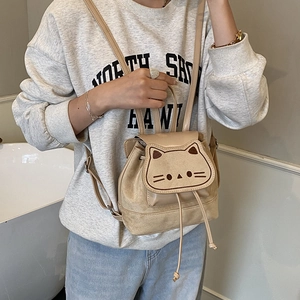 Minimalist beige matte backpack with cute cartoon cat ears for kids and teenagers