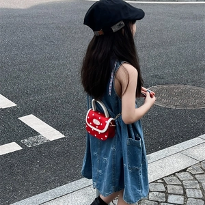 Sweet red polka dot mini bag for girls with white handle and chain strap for shoulder wear
