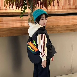 Colorful nylon crossbody bag for kids featuring a vibrant multi-color patchwork design