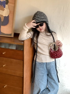 Red bow polka dot handbag styled with autumn knitwear and denim for kids