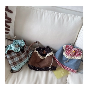 Details of cute drawstring bags with lace edges, floral prints and plaid patterns