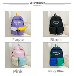 Detailed color selection showing purple, black, pink and navy contrast school backpacks